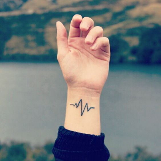 10 Tiny Tattoos For The Hopeless Romantic