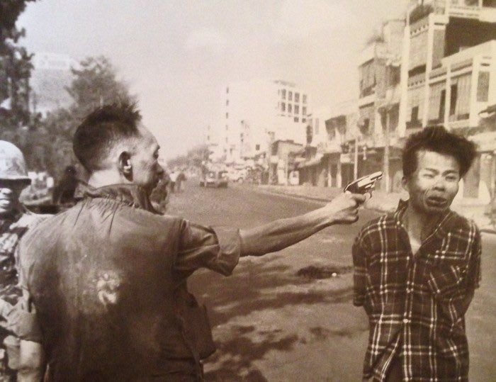 famous vietnam photo gun to head