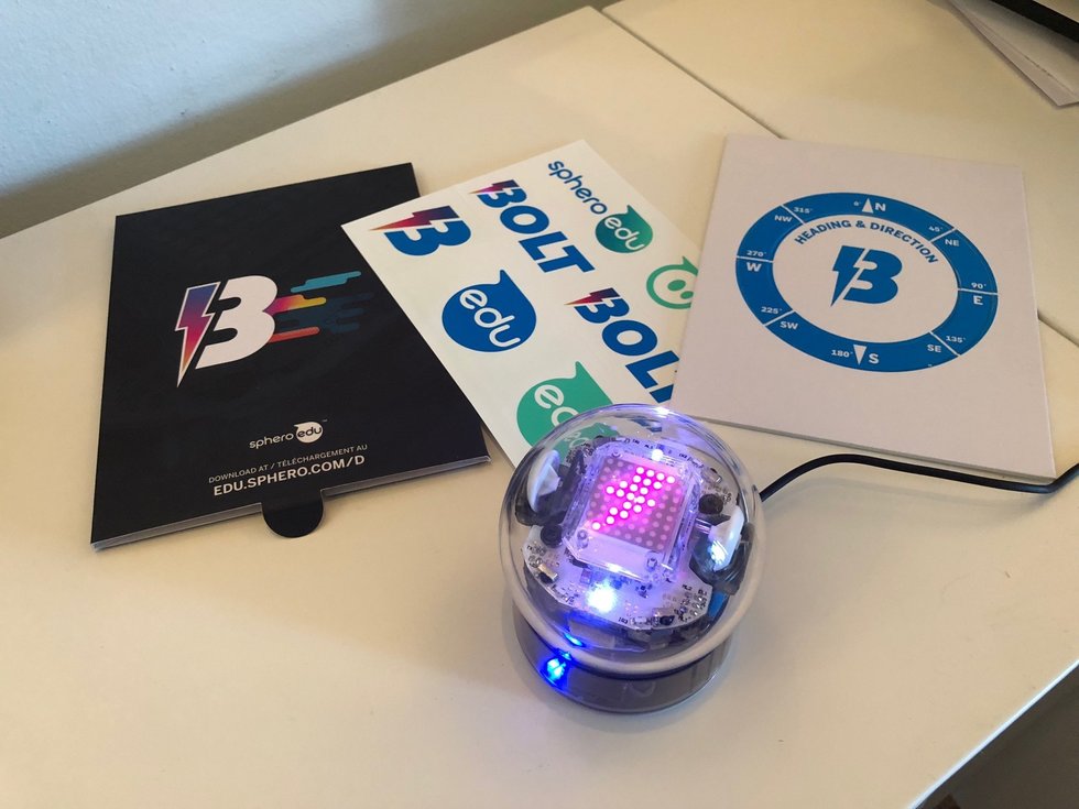 Picture of Sphero bolt on a desk with instructions.