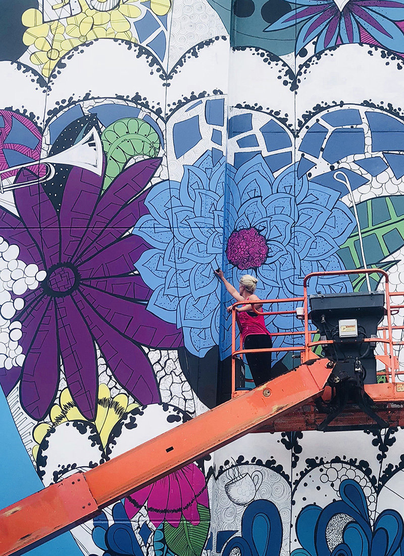 Kelsey working on the hot air balloon mural