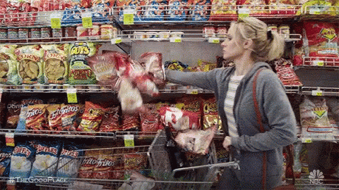 woman putting chips in her cart in one go