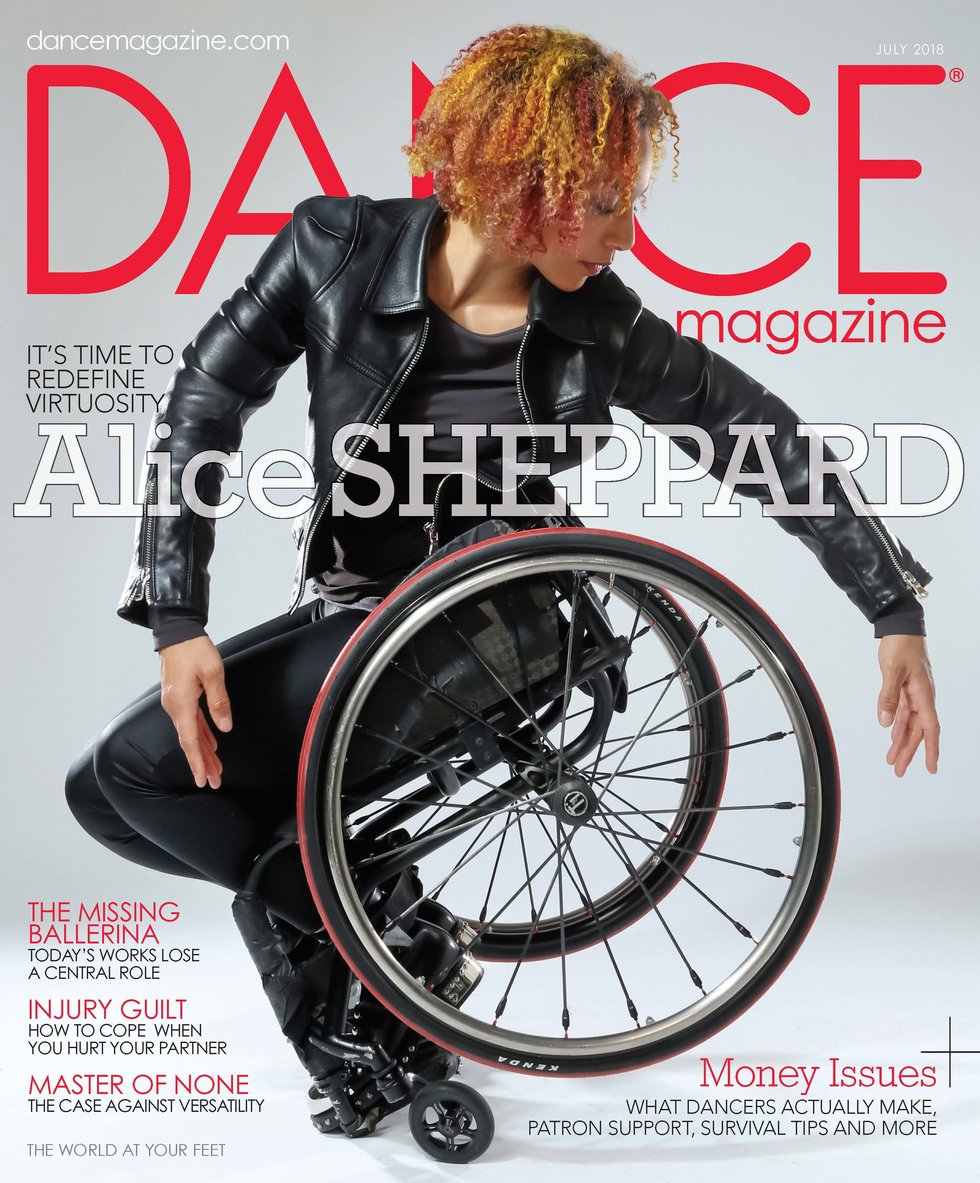 Dance Magazine's July cover featuring Alice Sheppard in a wheelchair, arms surrounding one of the wheels