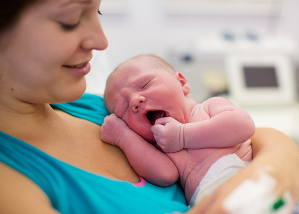 mom holding newborn