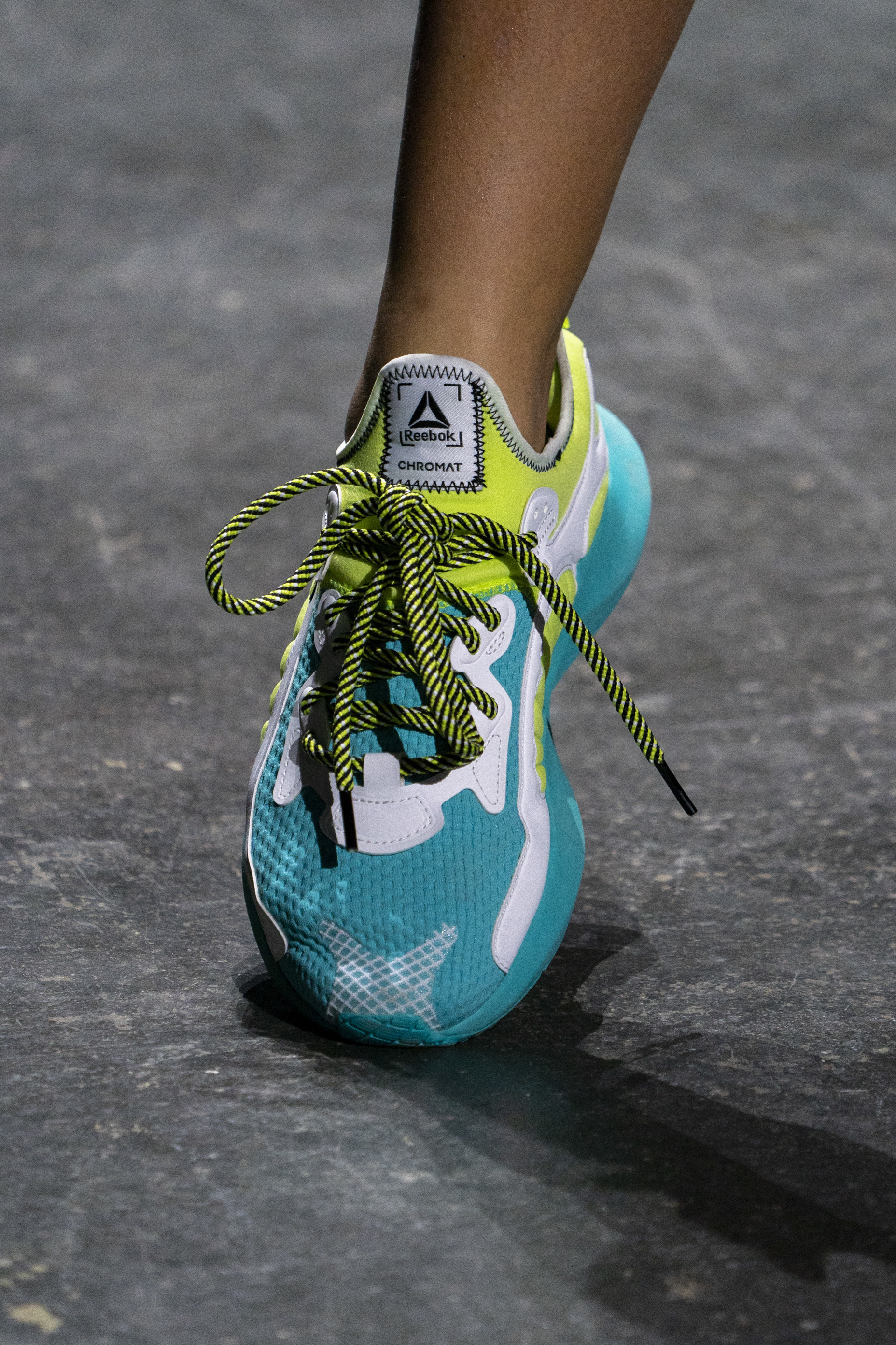 Reebok on Neon Sole Fury Sneakers 