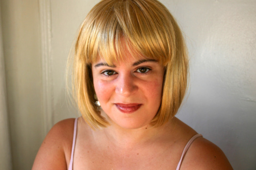 woman with alopecia wearing a wig
