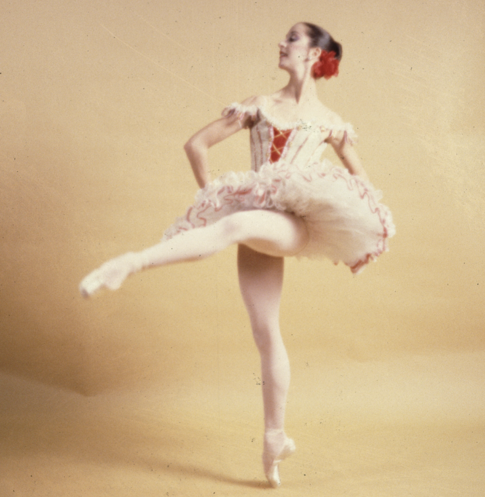 Cheryl Yeager in front attitude on pointe in a Kitri costume