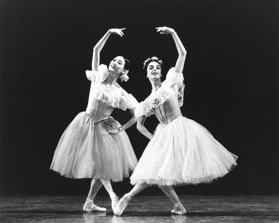 Yan Chen onstage with Alessandra Ferri in romantic tutus, leaning toward each other on a bent pli\u00e9 leg