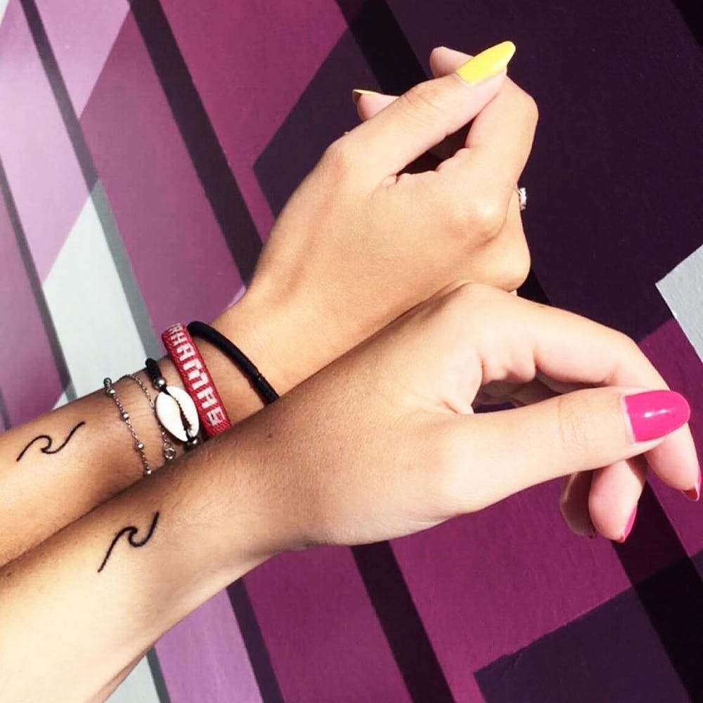 25 Sister Tattoo Ideas to Get With Your Other Half - Brit + Co