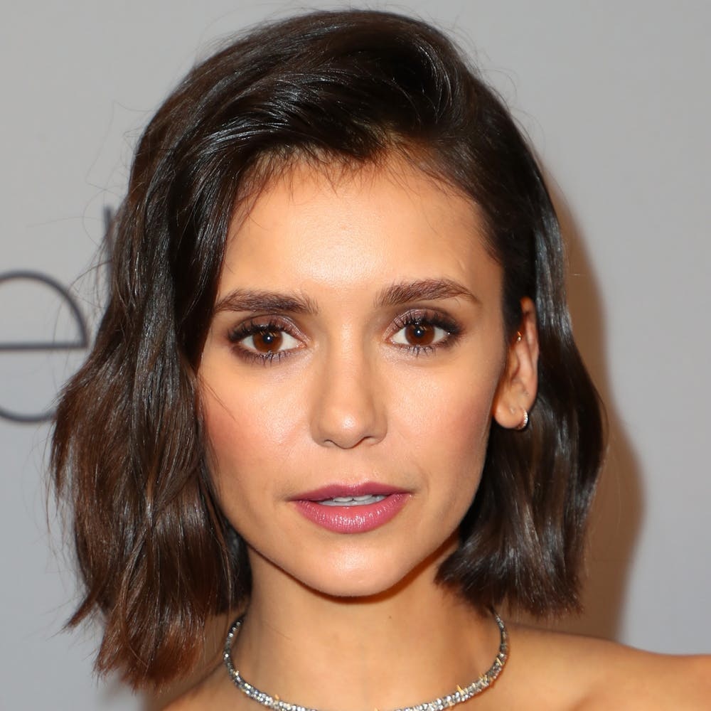 Nina Dobrev Is Completely Unrecognizable With A Short Blonde Wig