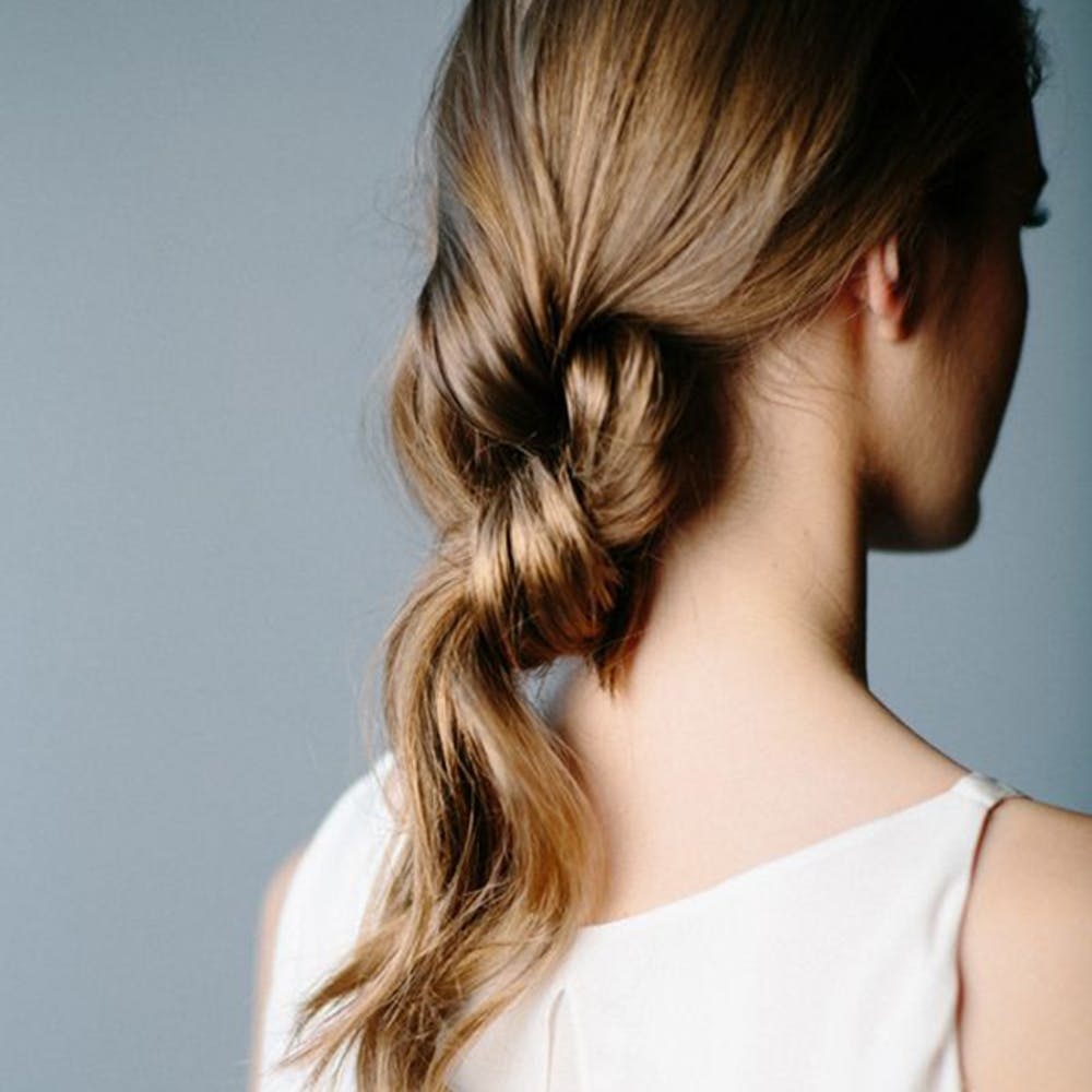 Banana Bun Hairstyles Are Here to Bring Out Your Inner French Girl - Brit +  Co