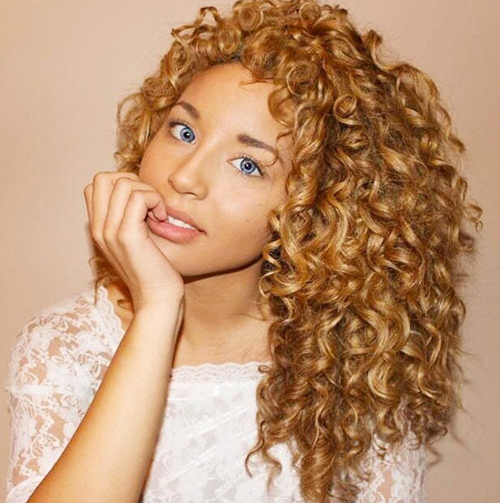 Got Curls? You NEED to Follow These YouTubers - Brit + Co
