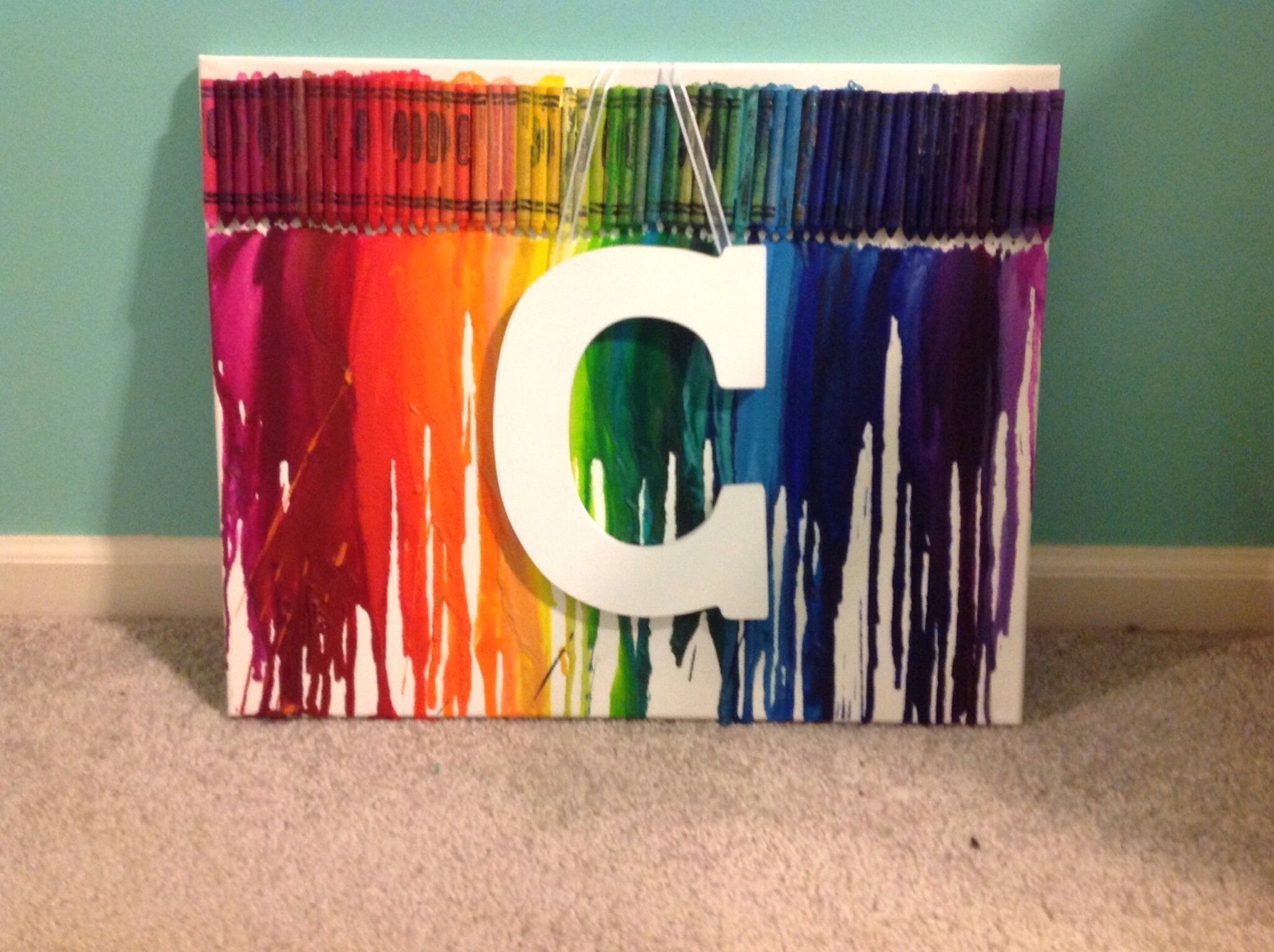 dripping crayons on canvas