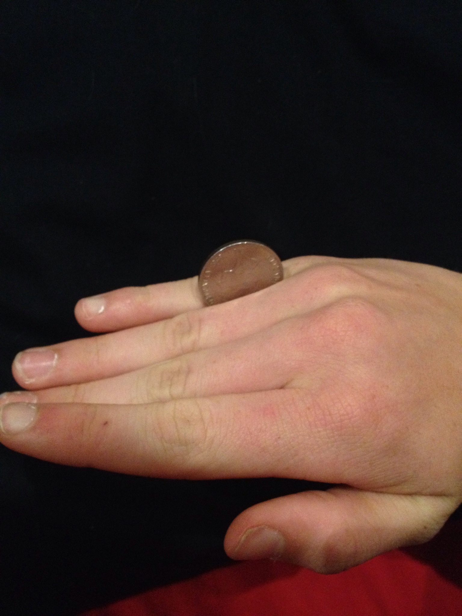 coin over knuckles trick