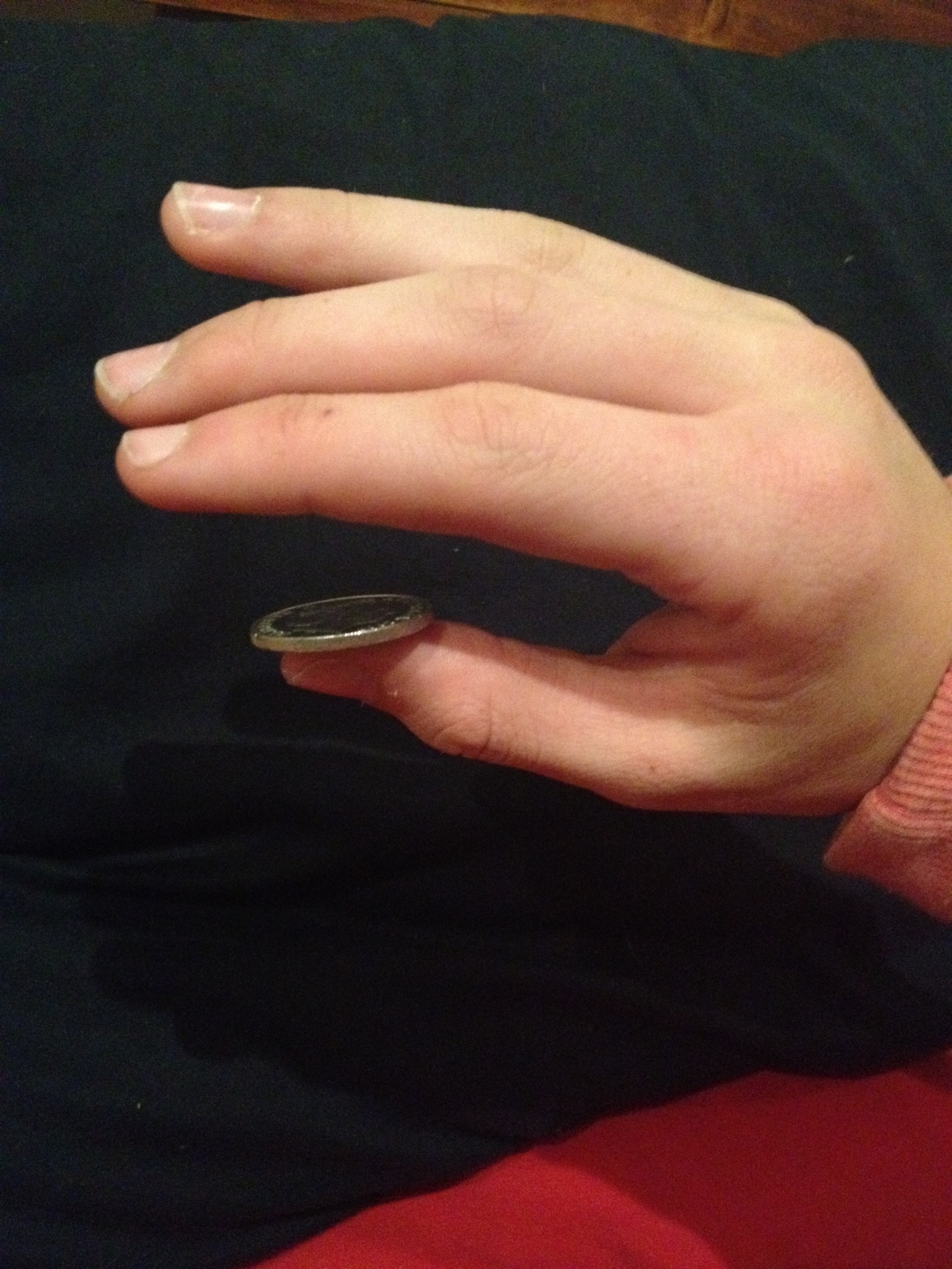 coin over knuckles trick