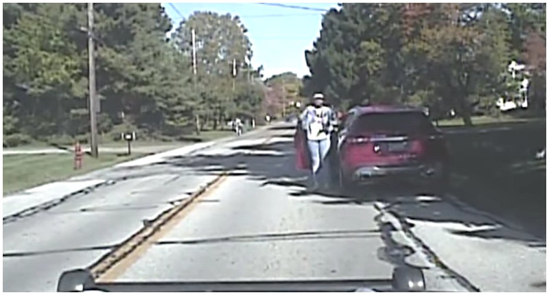 Cops pull guns on unarmed Black woman during routine traffic stop ...