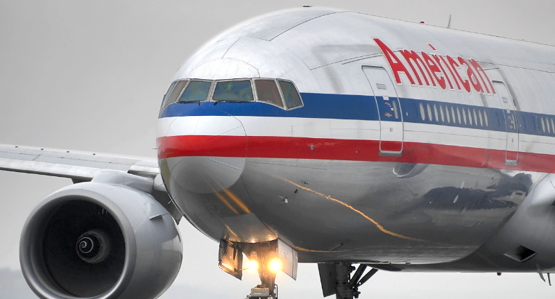 American Airlines passenger says runaway beverage cart caused brain ...