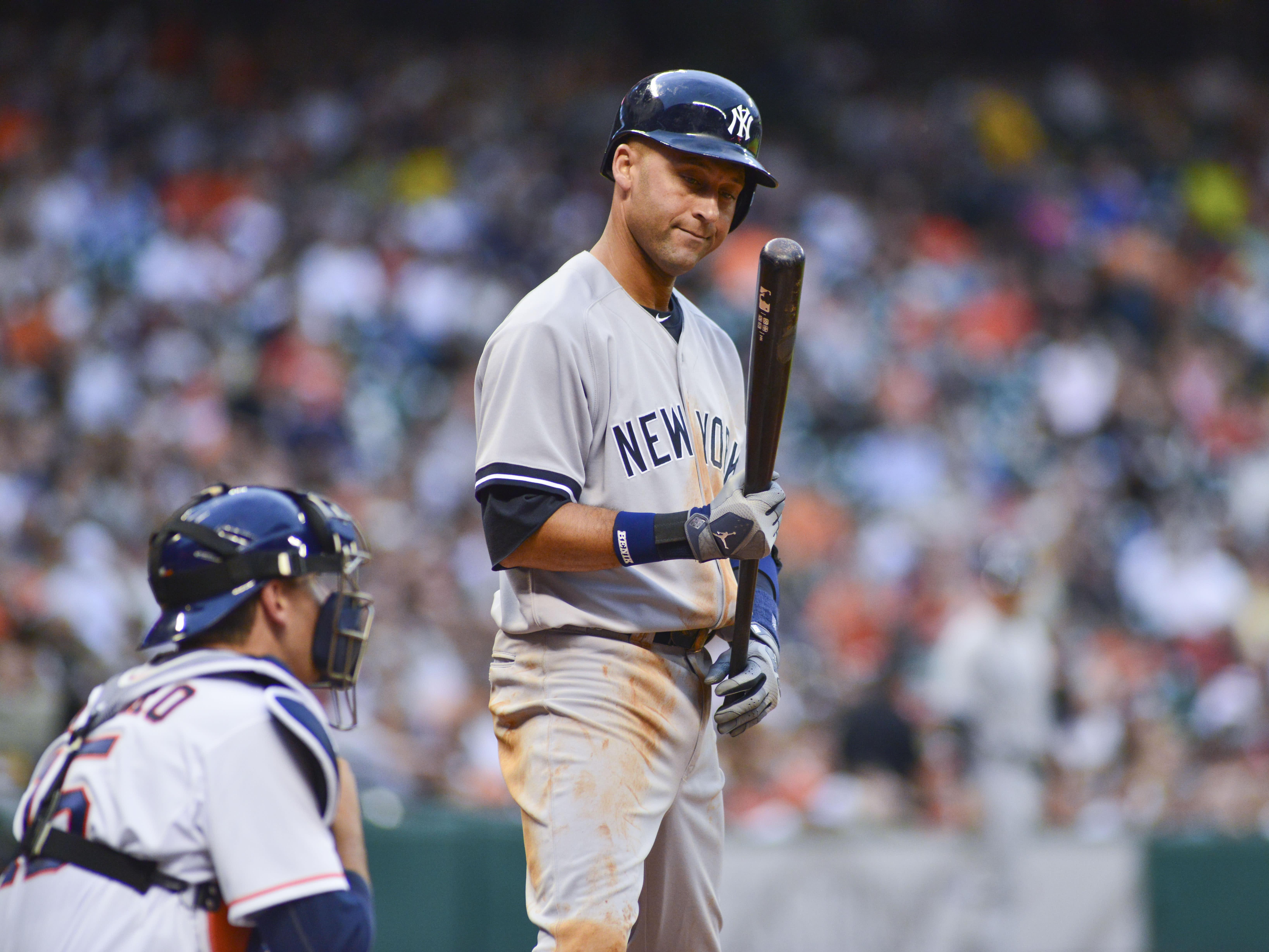 Houston Astros right fielder L.J. Hoes leaps to make a leaping