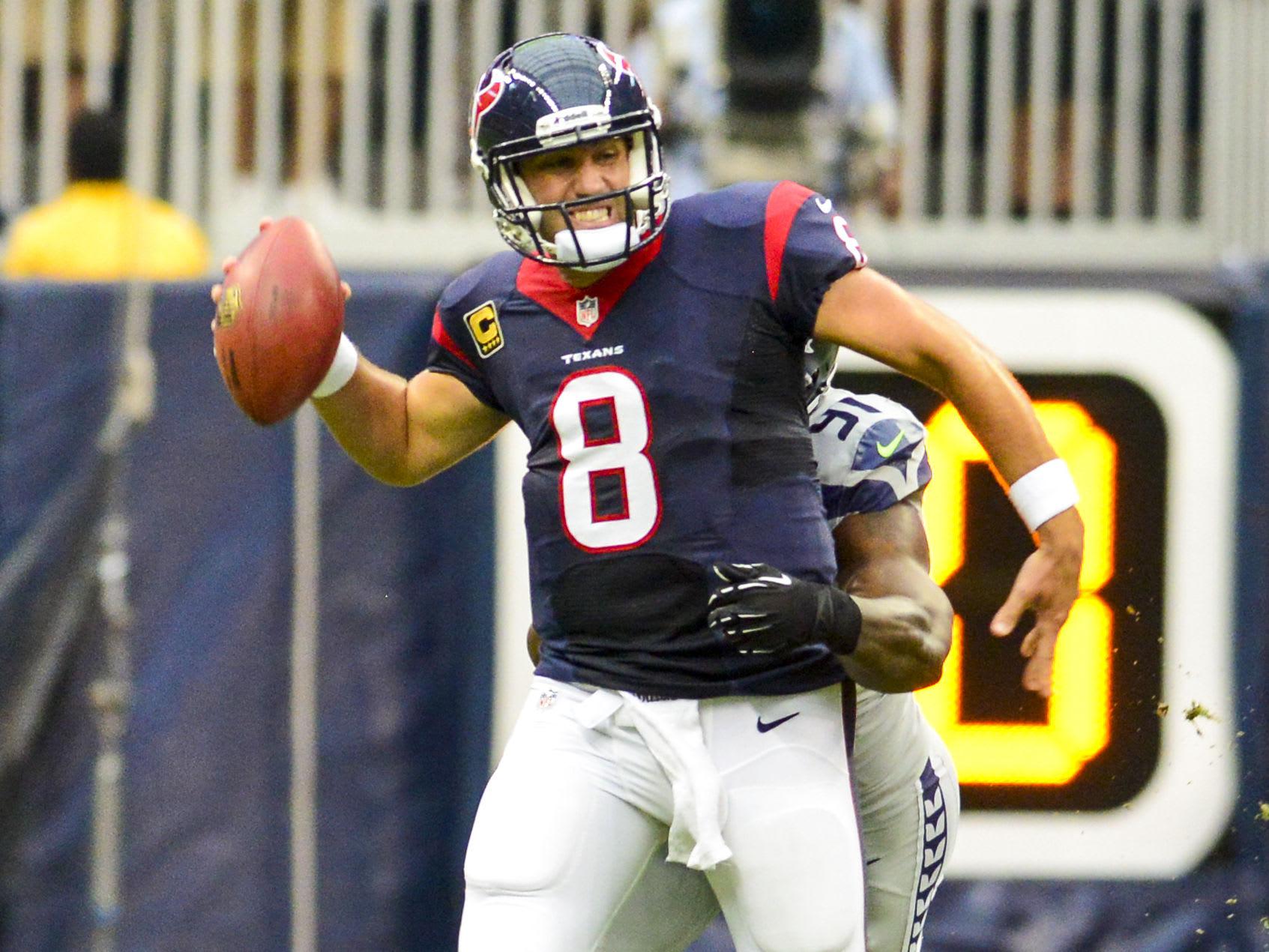 T.J. Yates replaces injured Matt Schaub, throws a pick-six of his own for  reeling Texans - Sports Illustrated