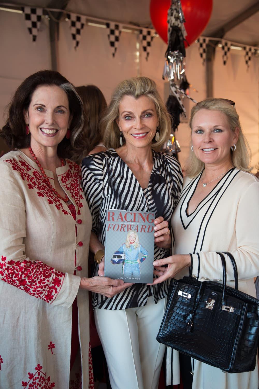 Mica Mosbacher in full racing gear launches new book with star