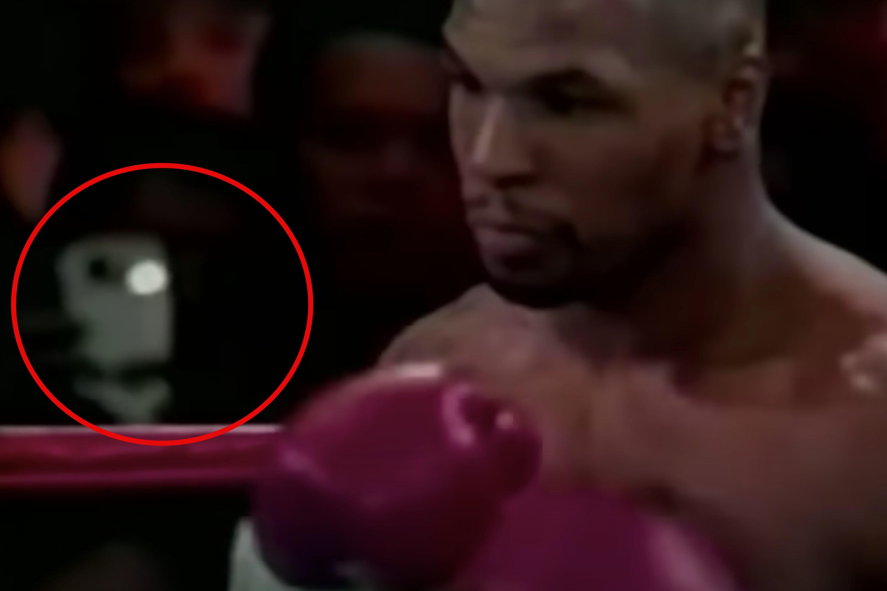 'Time traveller' spotted using smartphone at 1995 Mike Tyson fight