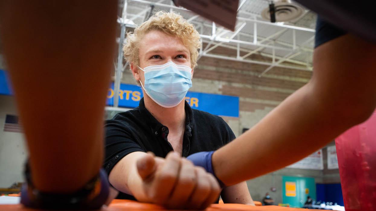 Young man about to get a dose of the mpox vaccine