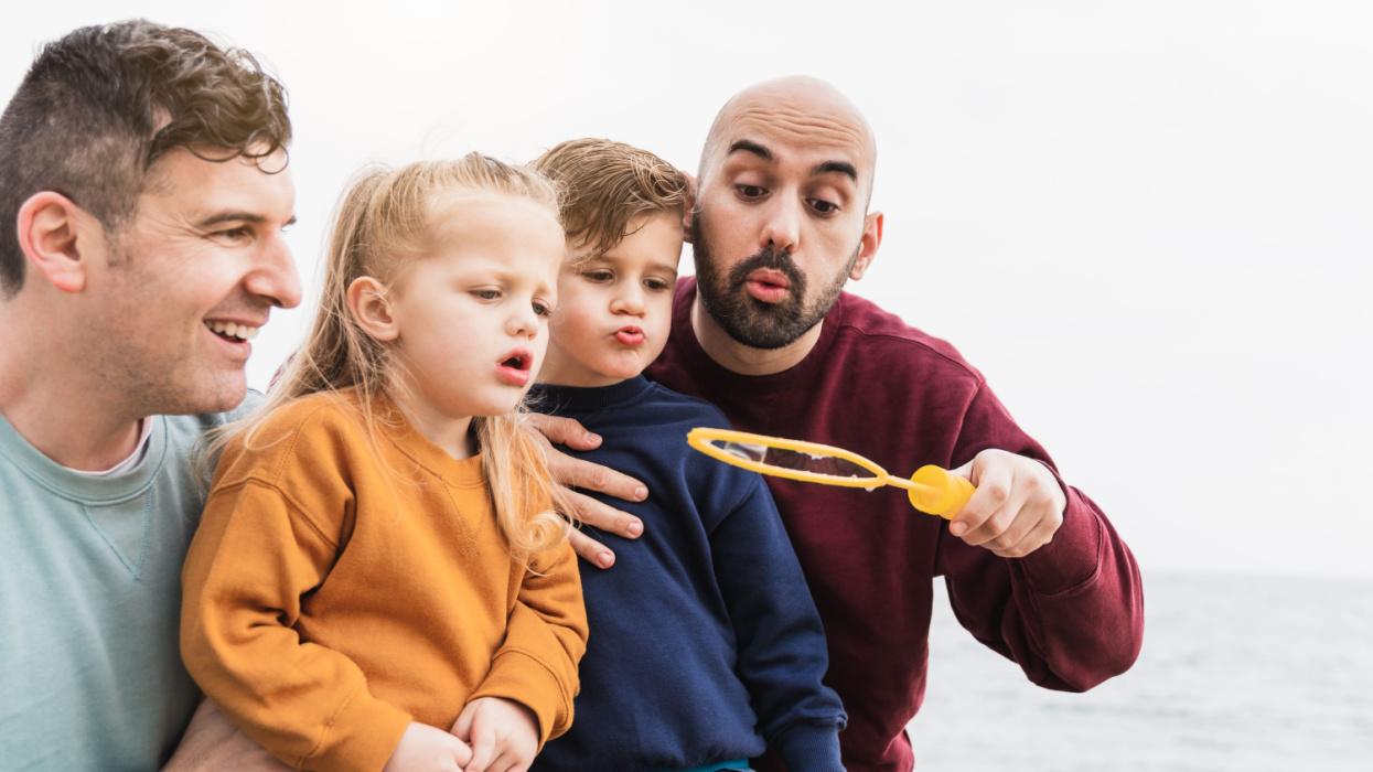 Queer family playing together