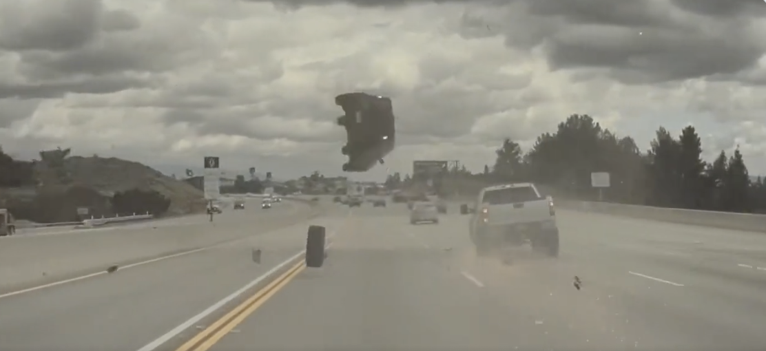 Ejected Truck Tire Launches Kia Into the Air on Freeway, Tesla Dash Cam Captures the Accident
