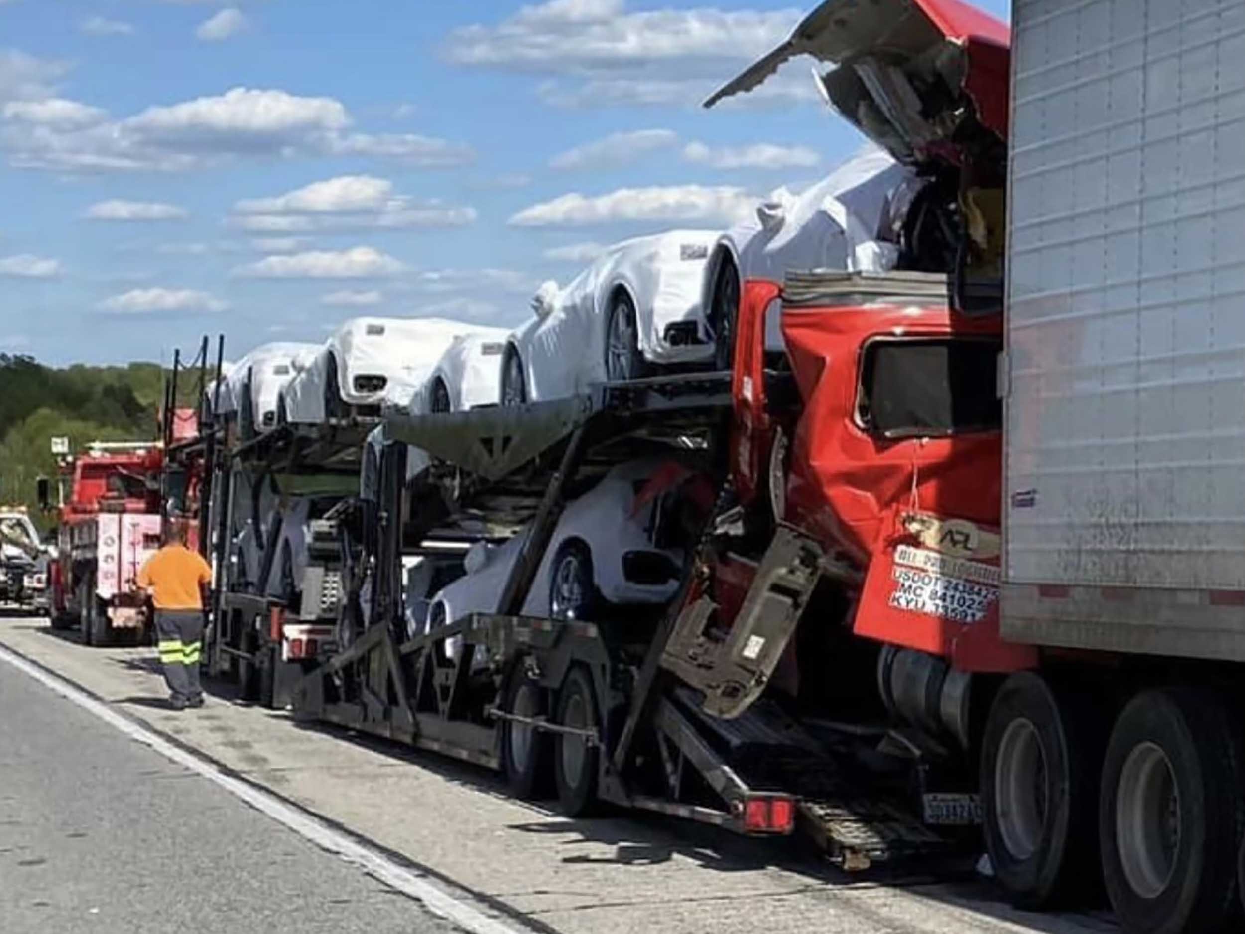 Two Semi Trucks Collide Causing C8 Corvette Destruction and One Life Lost