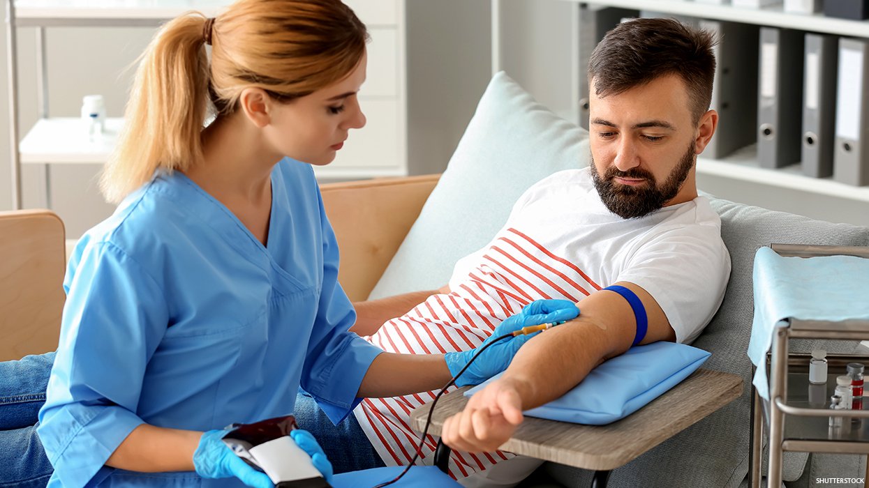 Man giving blood.