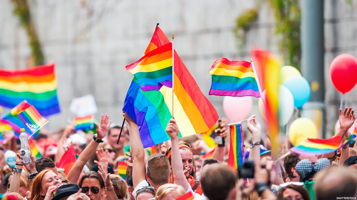 People with Pride flags