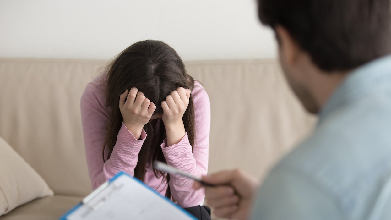 Doctor and teen patient