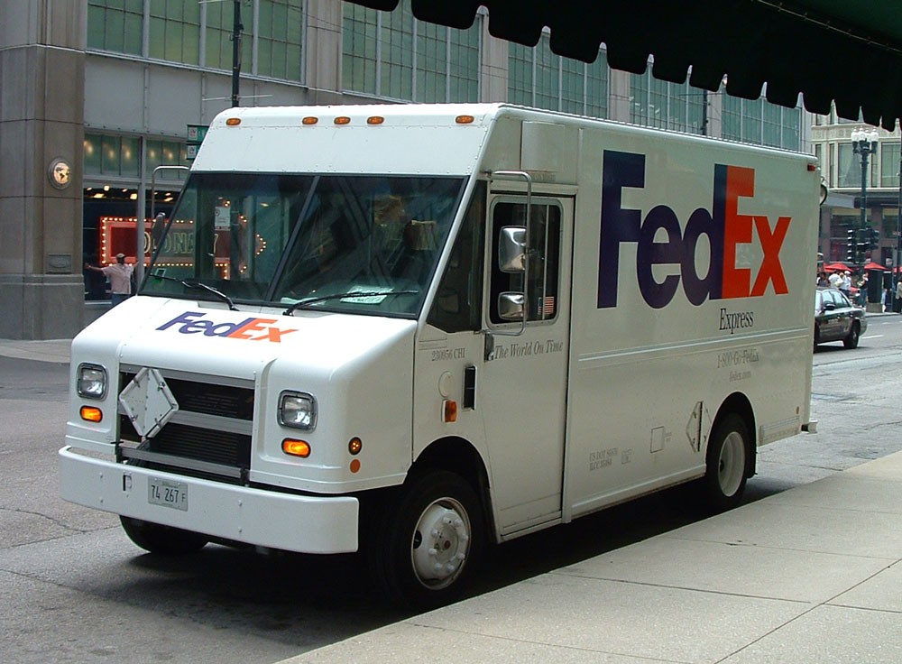 FedEx and Holman Automotive Sued: Accused of Odometer Fraud