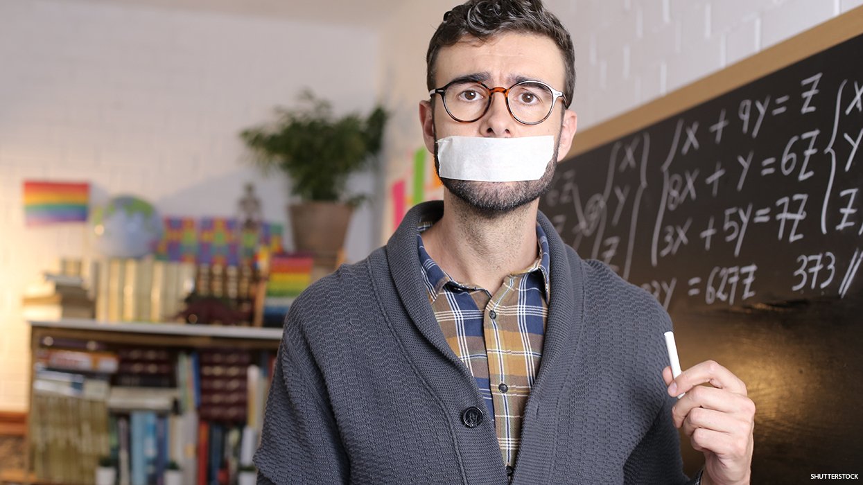 Teacher with mouth taped shut