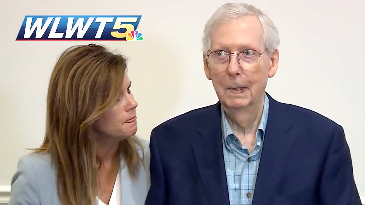 Mitch McConnell and aide