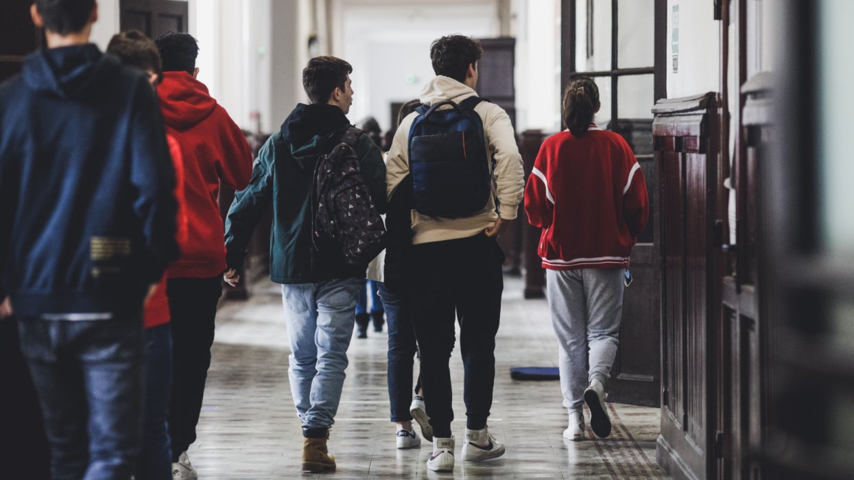 high schoolers in a hallway
