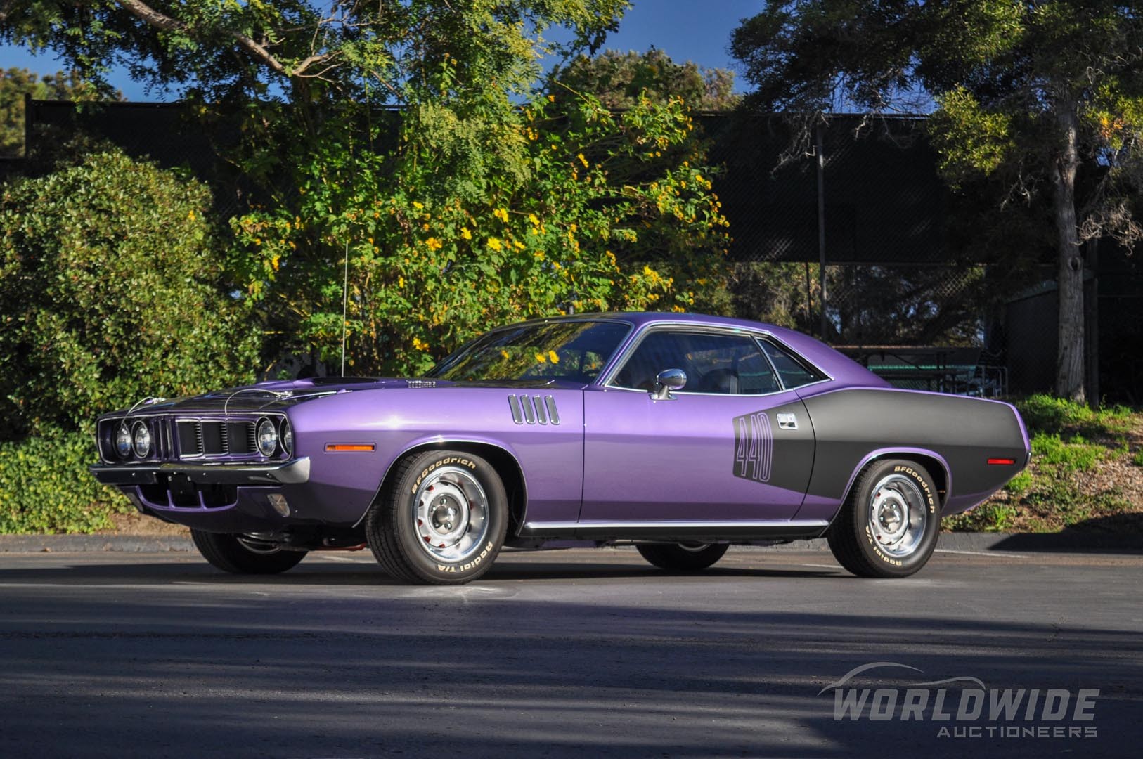 This Plum Crazy Purple 1971 Plymouth 'Cuda 440-6 is a Rare Numbers-Matching Track Pak American Muscle Car