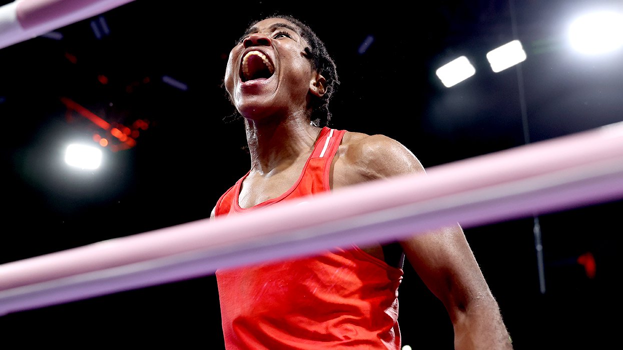 Cindy Winner Djankeu Ngamba of Refugee Olympic Team celebrates victory