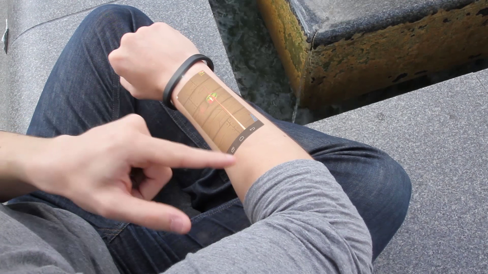 Bracelet to Project Your Phone Screen Onto Your Arm