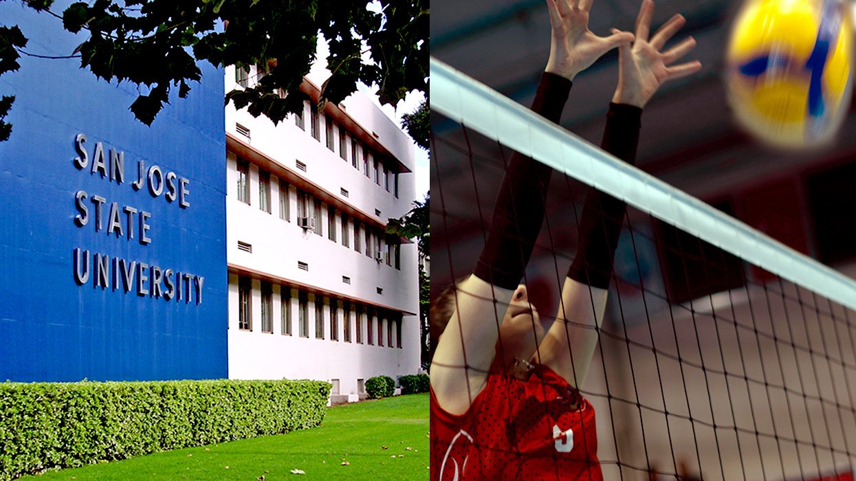 San Jose State University building young woman volleyball player at net during match