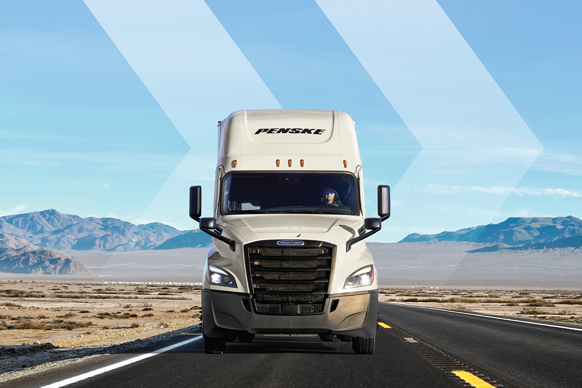 Penske truck driving through the desert