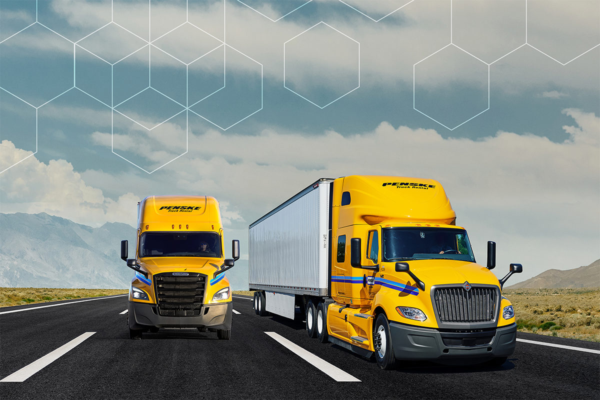 Penske trucks driving in the desert