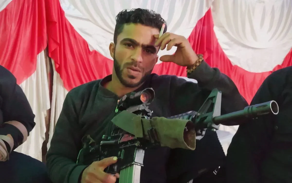 Gun-toting Palestinian migrant 'who called for death to all Jews' caught living in Corby HMO - paid for by you