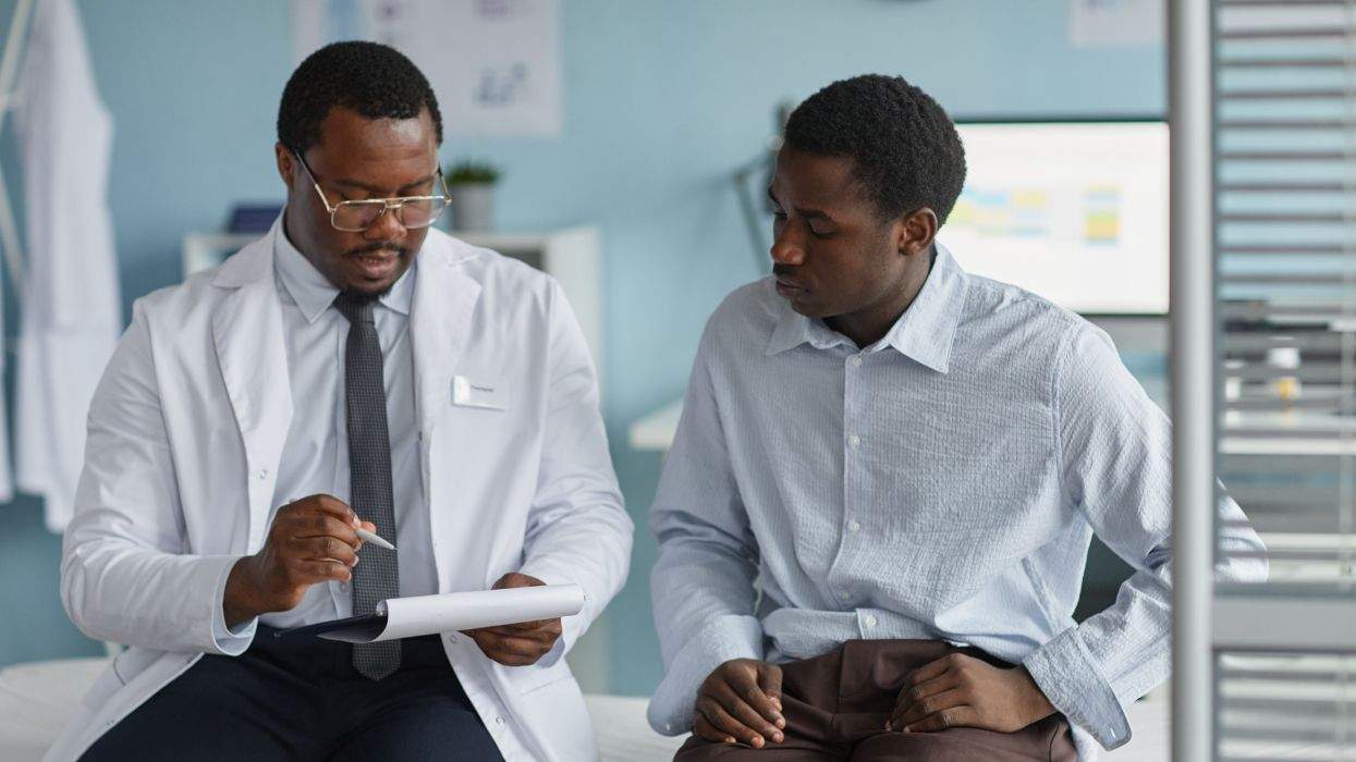 Black doctor and patient