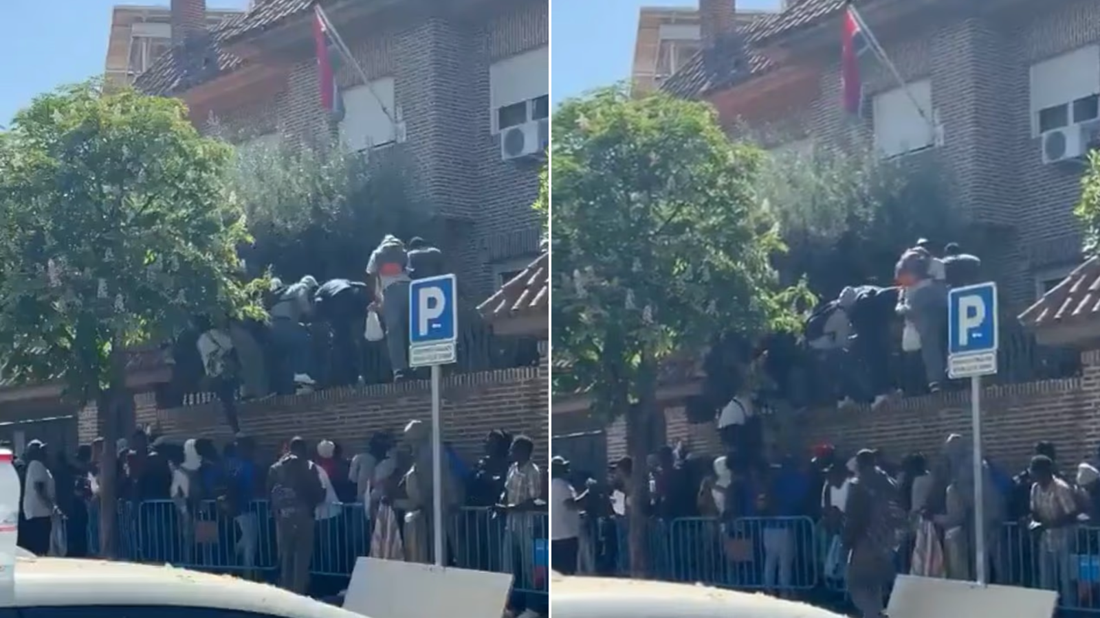 Migrants climb over embassy wall to secure paperwork after Spain gives 500,000 legal status to stay