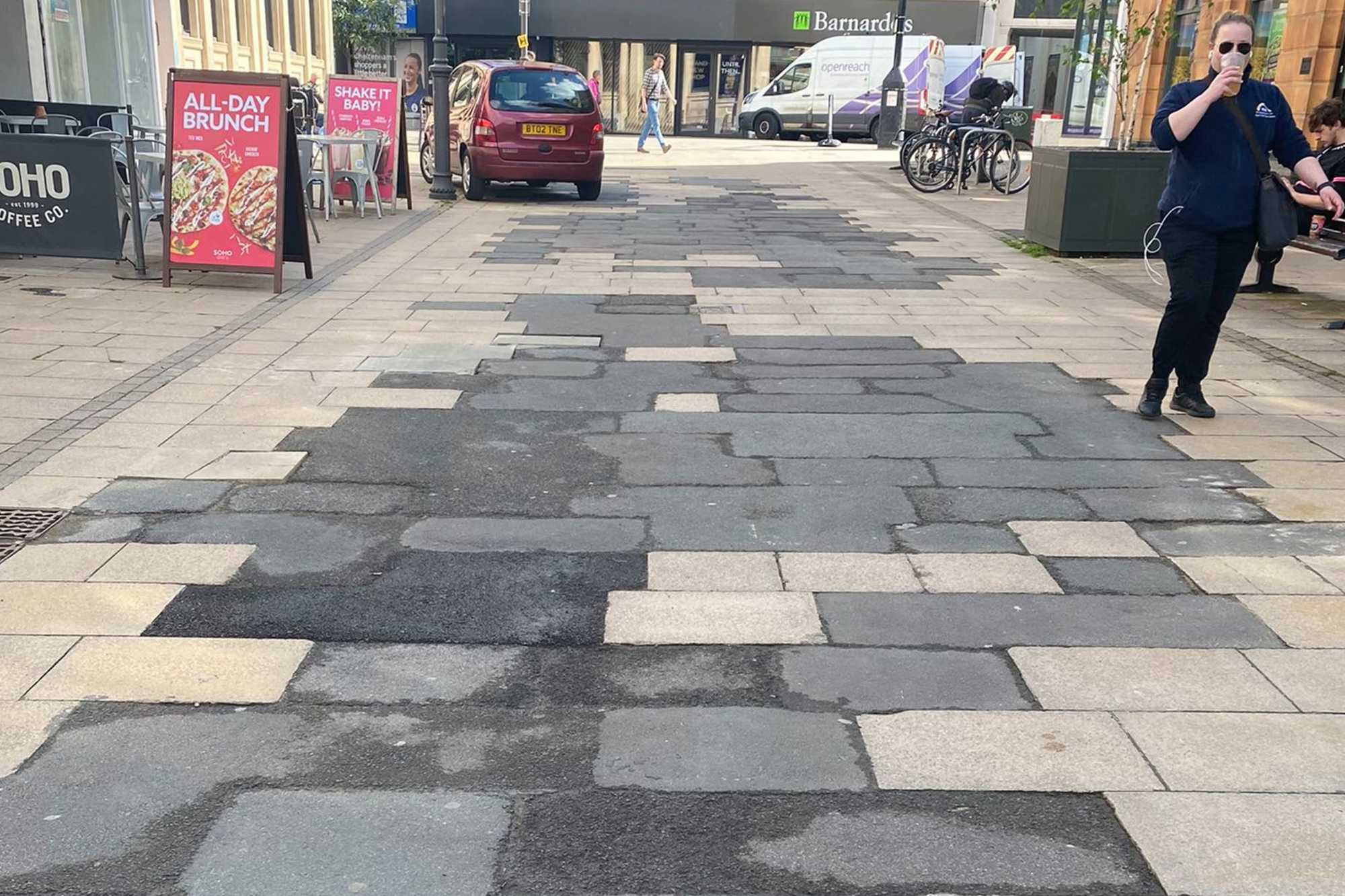 Lib Dem council could be hauled to COURT over 'tarmac cowpats' blighting historic town