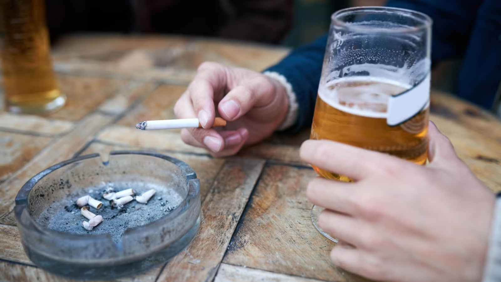 Killjoy Britain: Almost two thirds of country wants to BAN smoking in pub gardens, poll claims