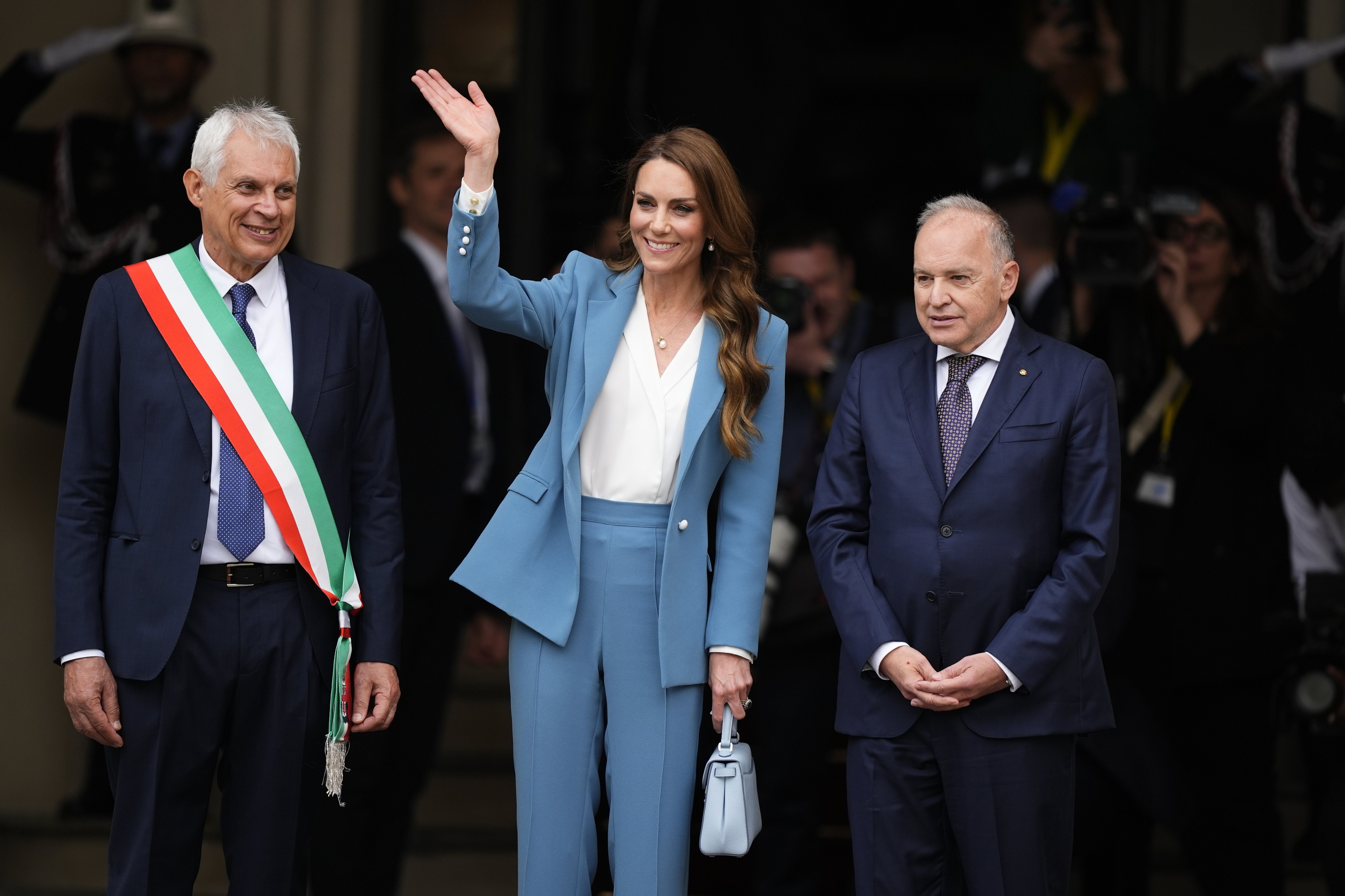 Catherine steps out in Italy for first international trip since her cancer treatment as royal receives honour