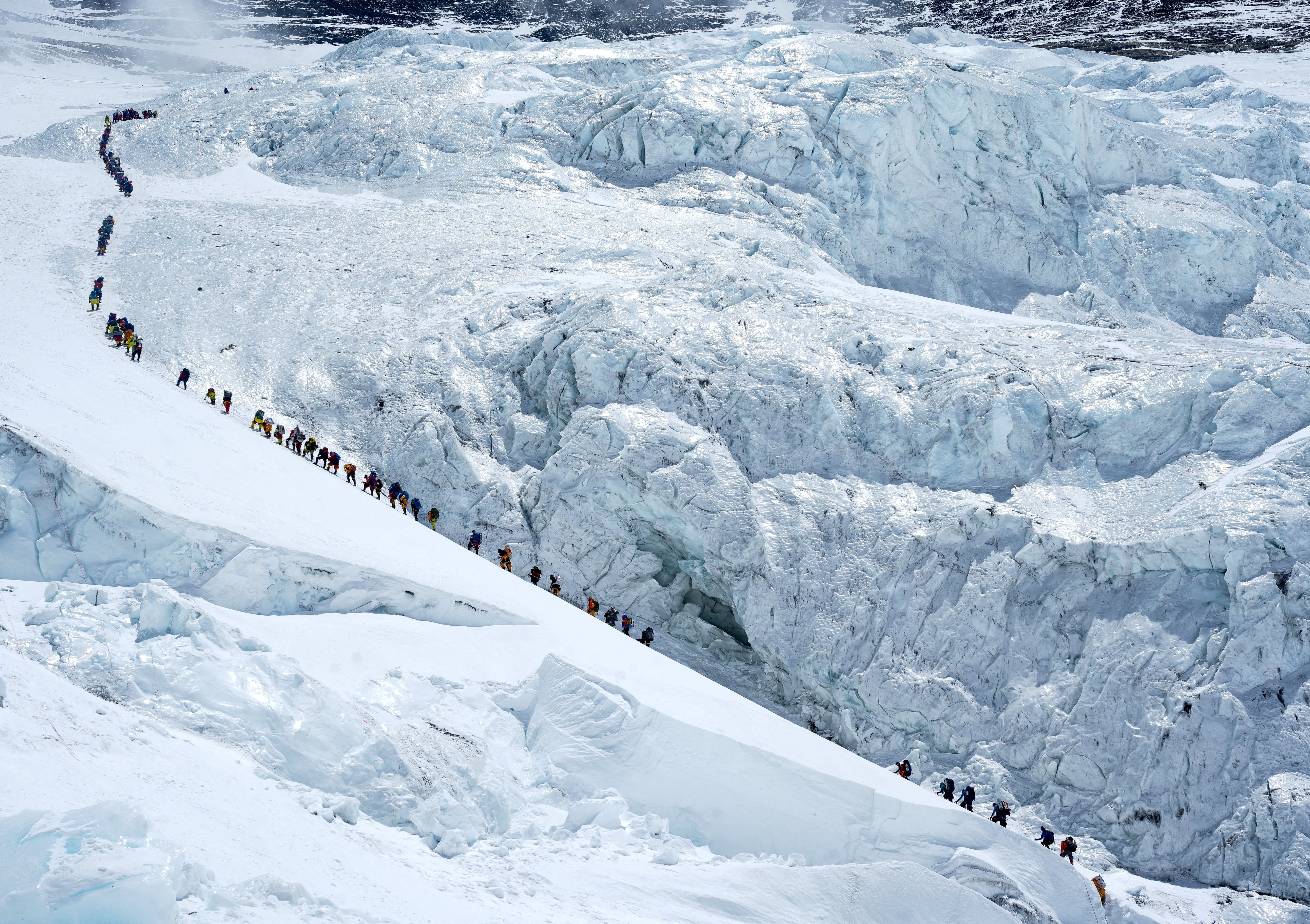 Queues clog Everest's ‘death zone’ as record number of climbers scale mountain