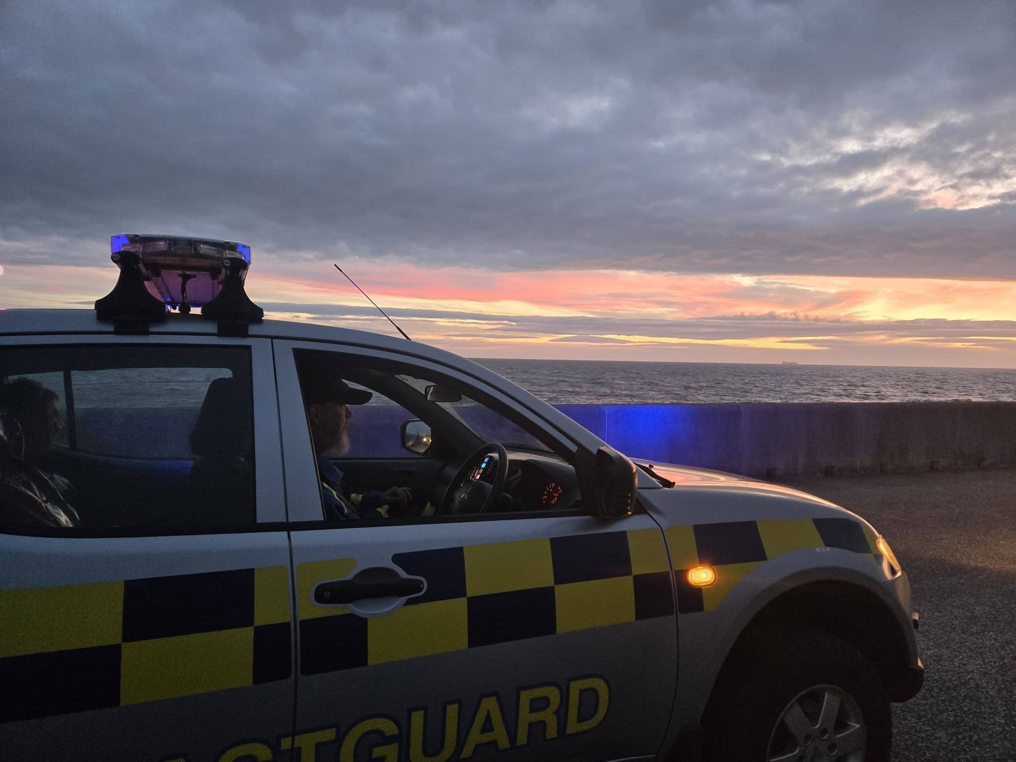 Woman dies and man in critical condition after entering sea to rescue trapped dog