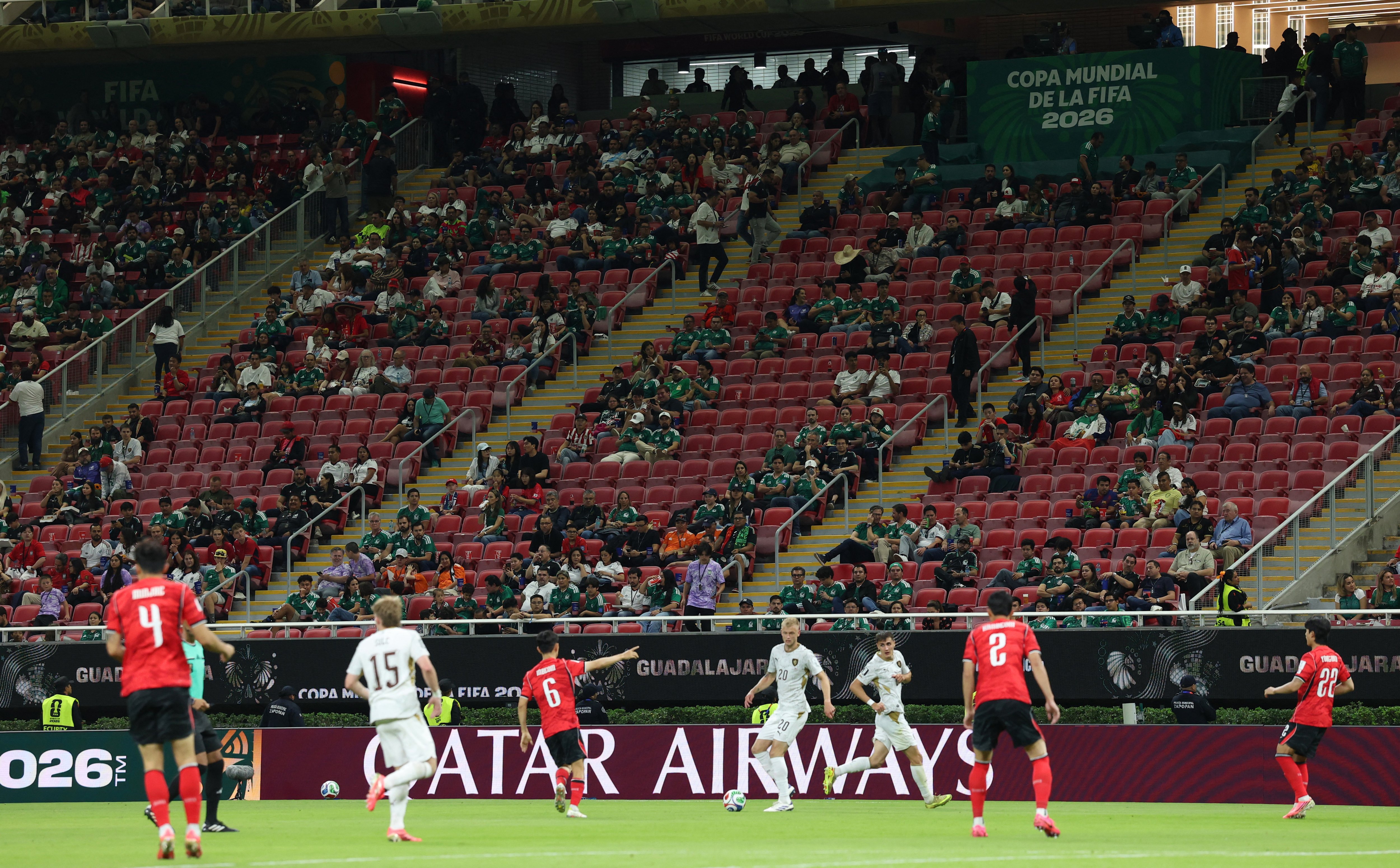 Hundreds of empty seats in second game of World Cup as organ